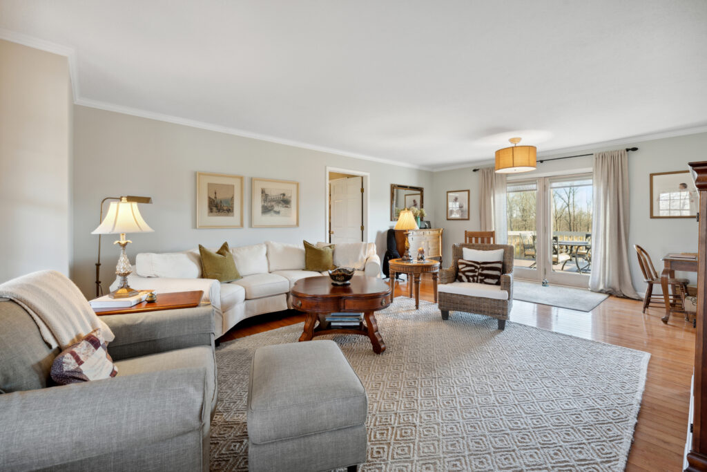 Bright and cozy living room with classic furniture and art.